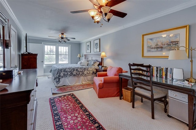 bedroom with carpet flooring, a ceiling fan, and crown molding