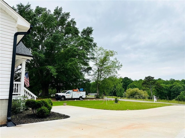 view of car parking featuring driveway