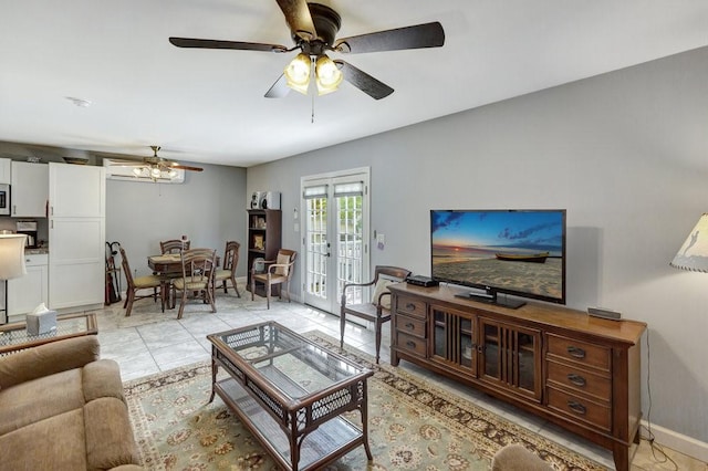living area featuring baseboards, ceiling fan, french doors, and light tile patterned floors