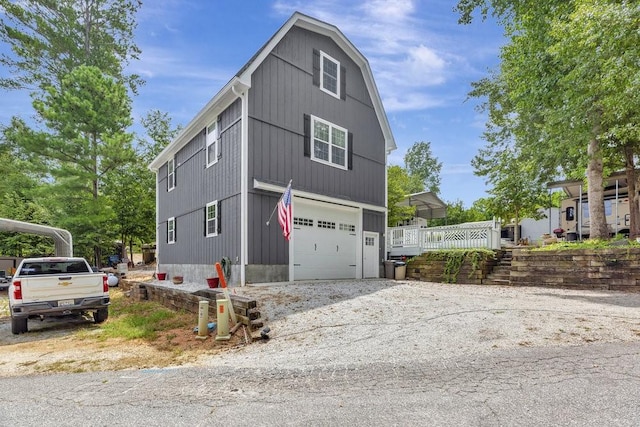 view of side of property with driveway