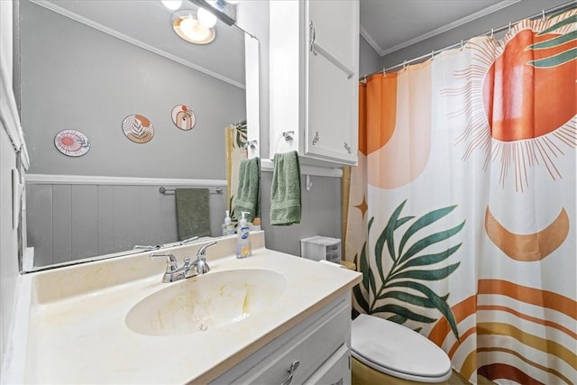 bathroom with vanity, a shower with curtain, ornamental molding, and toilet