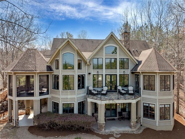 105 Green Cove Way, Six Mile, SC 29682 - back of property with a balcony, a chimney, roof with shingles, and a patio area