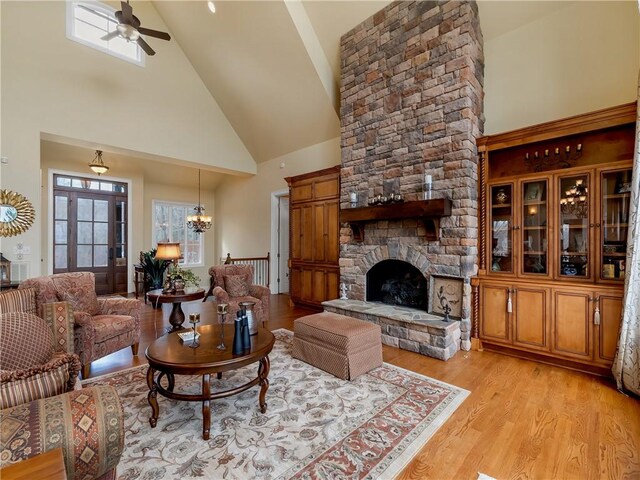 105 Green Cove Way, Six Mile, SC 29682 - living room with high vaulted ceiling, ceiling fan with notable chandelier, light wood-style floors, and a fireplace