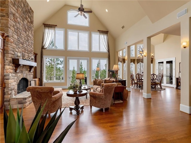 105 Green Cove Way, Six Mile, SC 29682 - living area featuring a wealth of natural light, a ceiling fan, a fireplace, wood finished floors, and visible vents