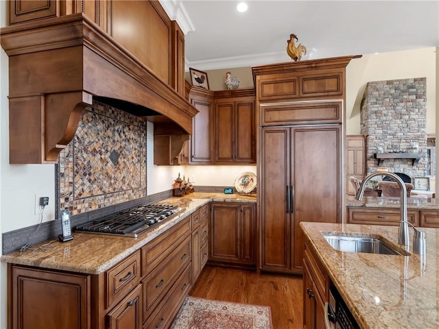 105 Green Cove Way, Six Mile, SC 29682 - kitchen featuring crown molding, stainless steel gas cooktop, a sink, paneled built in refrigerator, and wood finished floors