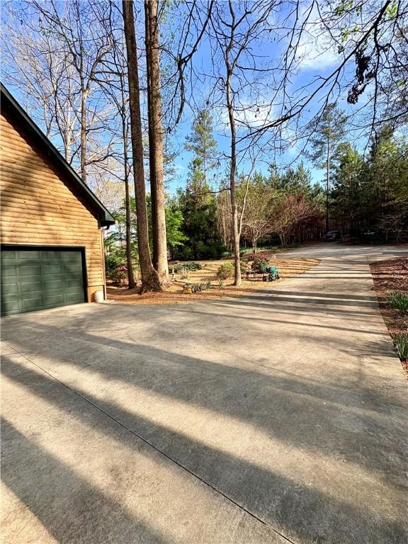 191 Crystal Ln, Townville, SC 29689 - view of yard with a garage
