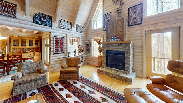 191 Crystal Ln, Townville, SC 29689 - living room with wooden ceiling, a healthy amount of sunlight, a stone fireplace, and wood finished floors