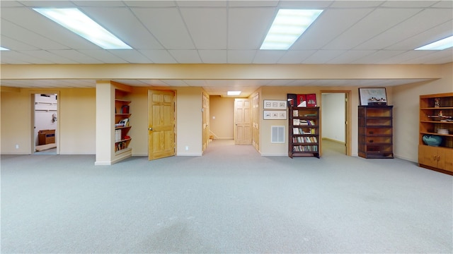 191 Crystal Ln, Townville, SC 29689 - finished below grade area featuring a drop ceiling, carpet floors, baseboards, and visible vents