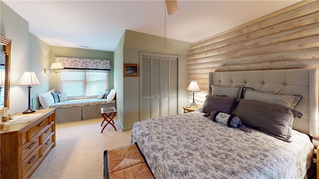 191 Crystal Ln, Townville, SC 29689 - bedroom with a closet, log walls, ceiling fan, and carpet