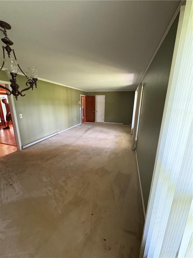 2506 Poplar Ln, Anderson, SC 29621 - spare room featuring light colored carpet, crown molding, a baseboard radiator, and a chandelier