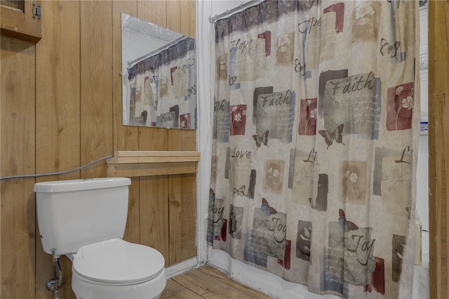 268 Ann St, Pickens, SC 29671 - bathroom featuring a shower with shower curtain, wood finished floors, and wooden walls