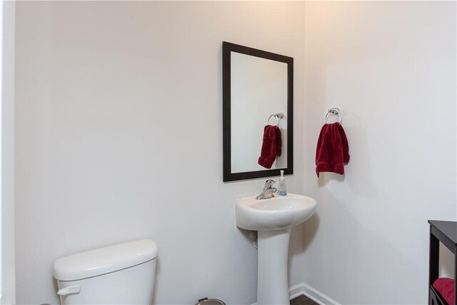 bathroom featuring toilet