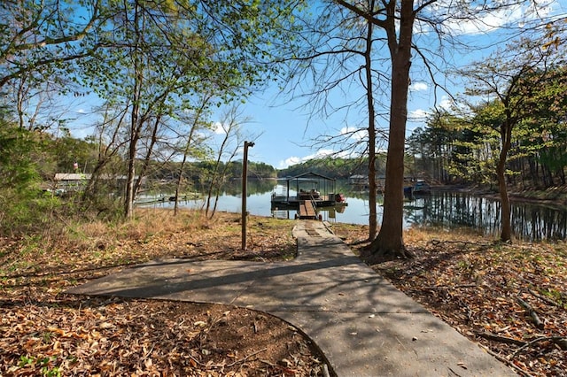 view of water feature featuring boat lift and a boat dock