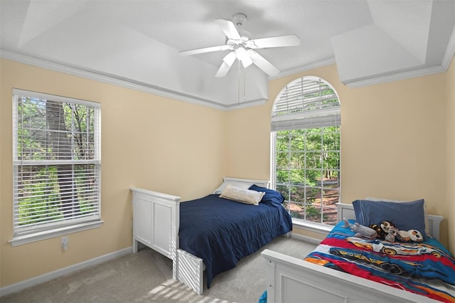 bedroom featuring baseboards, ornamental molding, ceiling fan, and carpet floors