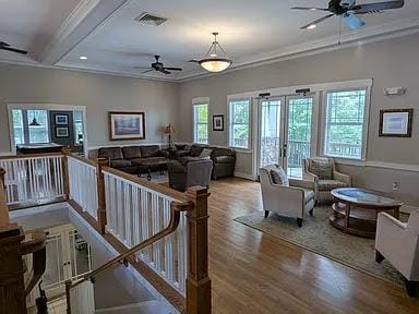 235 Lookover Dr, Anderson, SC 29621 - living room with ceiling fan, wood finished floors, crown molding, and beam ceiling