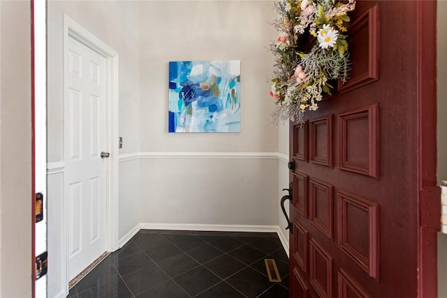 203 W Blue Heron Dr, Salem, SC 29676 - entryway featuring dark tile patterned floors and baseboards