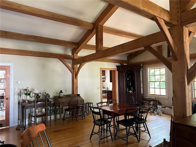 171 E Main St, Pendleton, SC 29670 - dining area featuring wood-type flooring and vaulted ceiling with beams