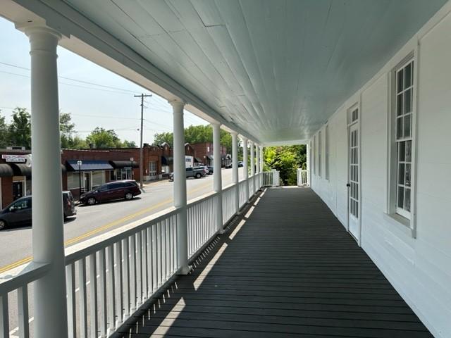 171 E Main St, Pendleton, SC 29670 - wooden terrace featuring covered porch