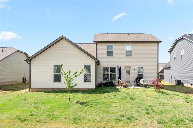 185 Norfolk Cir, Anderson, SC 29625 - back of house with central air condition unit and a yard