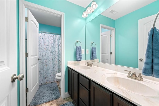 185 Norfolk Cir, Anderson, SC 29625 - bathroom featuring double vanity, visible vents, toilet, and a sink