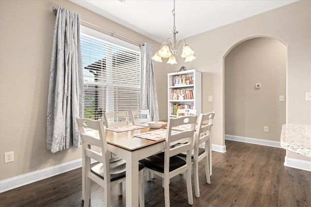 185 Norfolk Cir, Anderson, SC 29625 - dining space with arched walkways, baseboards, a chandelier, and dark wood finished floors