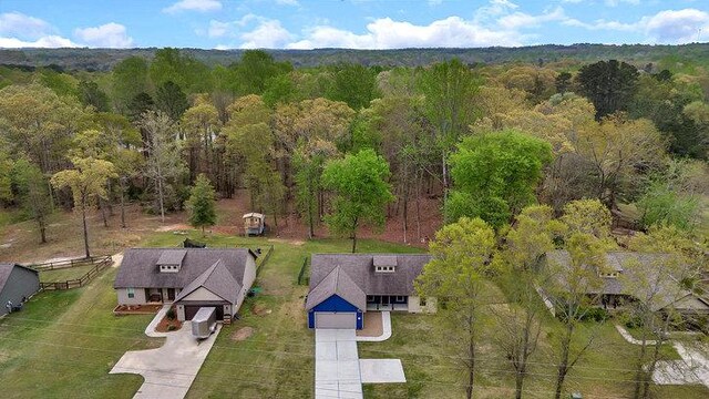 aerial view featuring a forest view