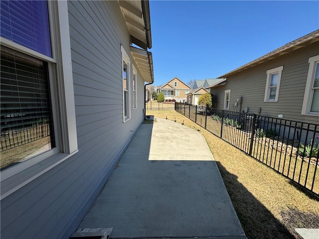 exterior space with a patio area and fence