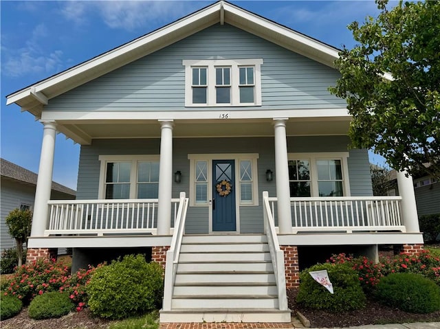 bungalow-style home featuring covered porch