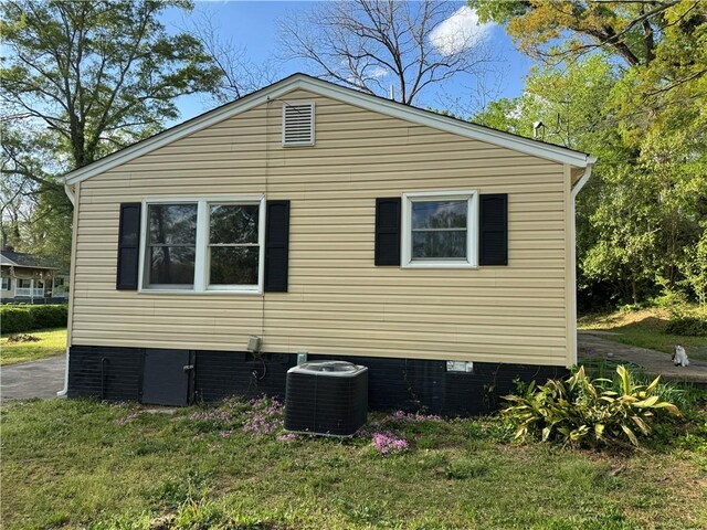 405 Casey St, Anderson, SC 29624 - view of side of home with central AC, a yard, and crawl space