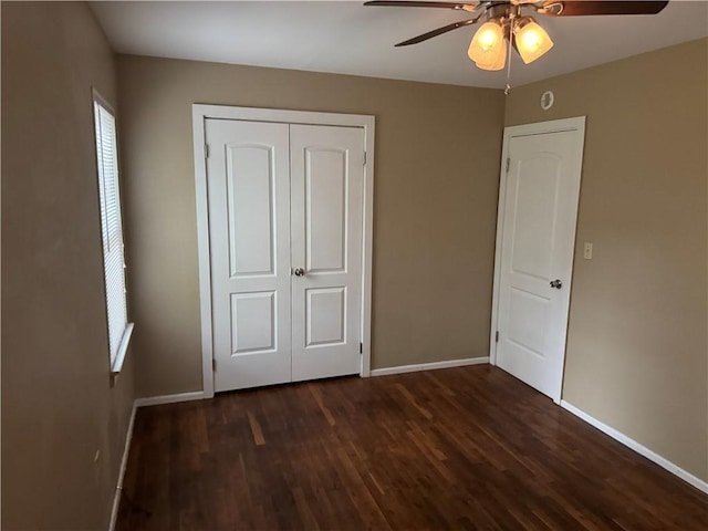 405 Casey St, Anderson, SC 29624 - unfurnished bedroom featuring a closet, baseboards, a ceiling fan, and wood finished floors