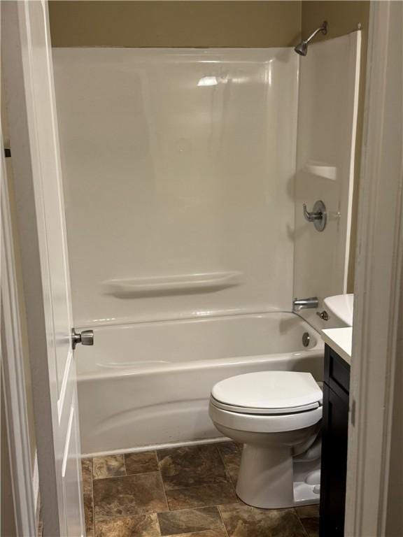 405 Casey St, Anderson, SC 29624 - bathroom featuring  shower combination, toilet, vanity, and stone finish flooring