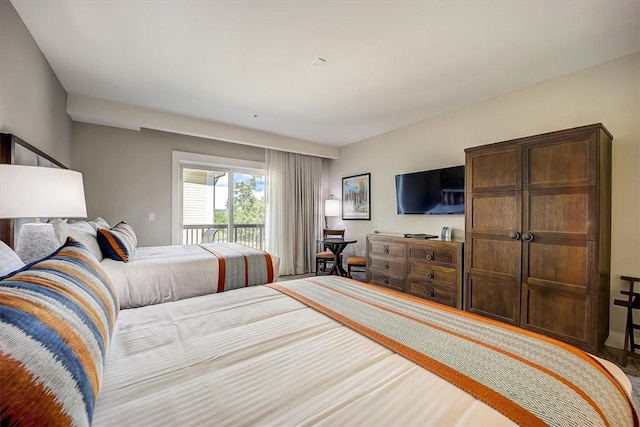 bedroom featuring access to outside