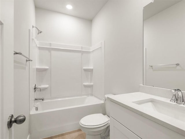 bathroom featuring vanity, toilet, shower / bath combination, and recessed lighting