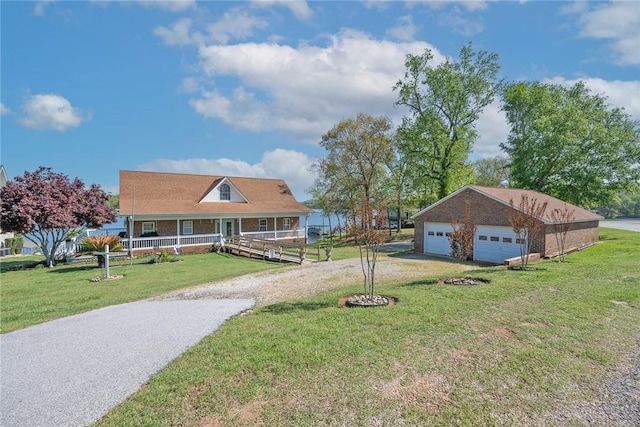 417 Mcgill Cir, Iva, SC 29655 - view of front of property featuring a porch, a detached garage, a front yard, and driveway