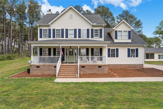 colonial home with crawl space, roof with shingles, covered porch, and a front lawn