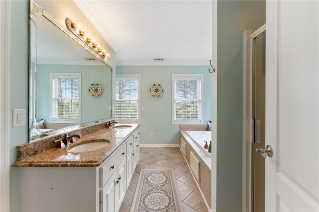 bathroom with visible vents, a sink, ornamental molding, and tile patterned flooring