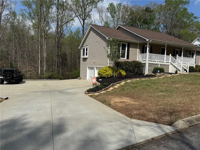 15009 Beacon Ridge Dr, Seneca, SC 29678 - view of home's exterior with a porch, driveway, a garage, stairs, and a yard