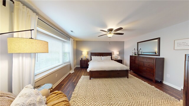 15009 Beacon Ridge Dr, Seneca, SC 29678 - bedroom with wood finished floors, baseboards, and a ceiling fan