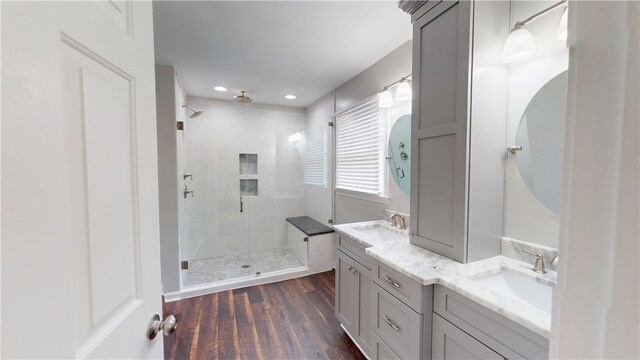 15009 Beacon Ridge Dr, Seneca, SC 29678 - full bathroom with a shower stall, double vanity, wood finished floors, and recessed lighting