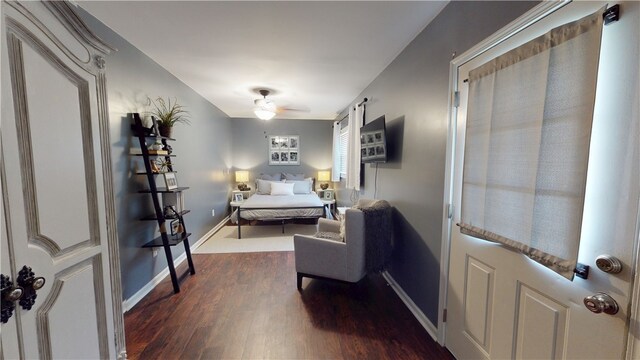 15009 Beacon Ridge Dr, Seneca, SC 29678 - bedroom with dark wood-style flooring, baseboards, and a ceiling fan