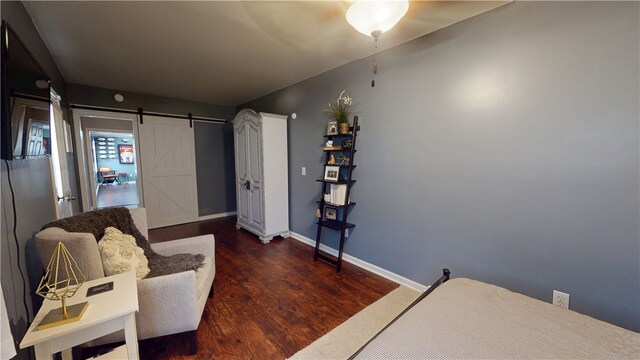 15009 Beacon Ridge Dr, Seneca, SC 29678 - living area with wood finished floors, a barn door, and baseboards