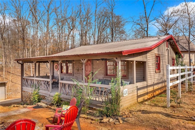 124-130 S Port Bass Dr, Fair Play, SC 29643 - exterior space featuring covered porch, fence, and metal roof
