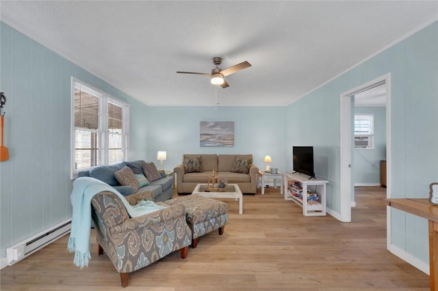 124-130 S Port Bass Dr, Fair Play, SC 29643 - living area featuring plenty of natural light, baseboard heating, light wood-style flooring, and ceiling fan