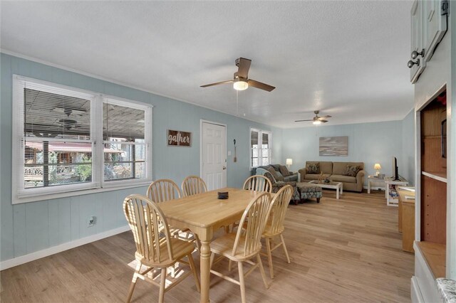 124-130 S Port Bass Dr, Fair Play, SC 29643 - dining room featuring ceiling fan, light wood-type flooring, and baseboards