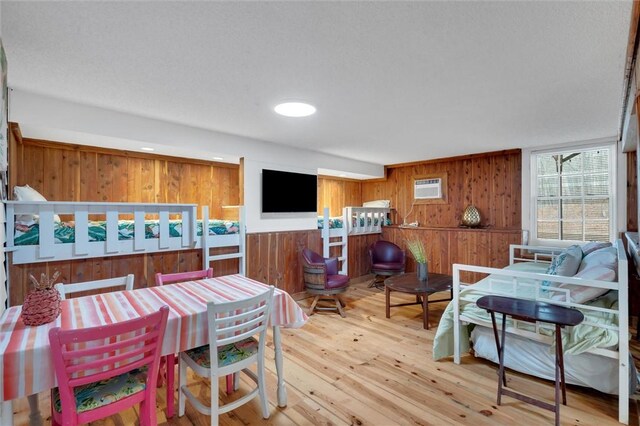 124-130 S Port Bass Dr, Fair Play, SC 29643 - dining room featuring wooden walls and wood-type flooring