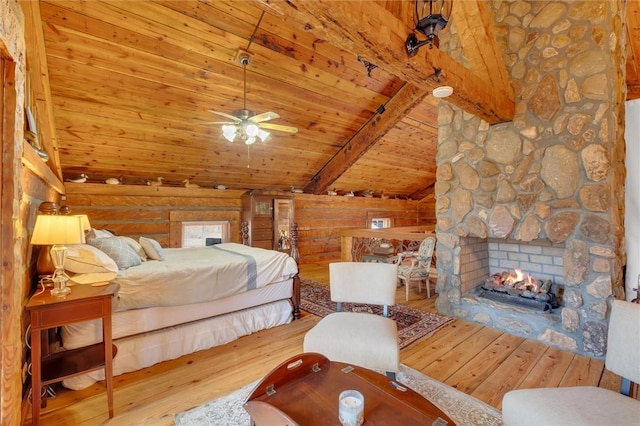 124-130 S Port Bass Dr, Fair Play, SC 29643 - bedroom featuring vaulted ceiling with beams, wooden ceiling, a fireplace, and hardwood / wood-style floors