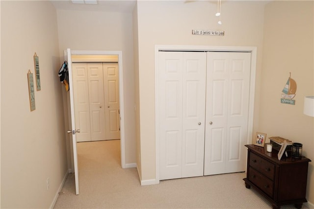 1226 Bowersville Hwy, Hartwell, GA 30643 - bedroom with a closet, baseboards, and light colored carpet
