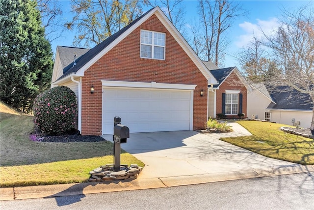 view of front of house with a garage, a front yard, brick siding, and driveway