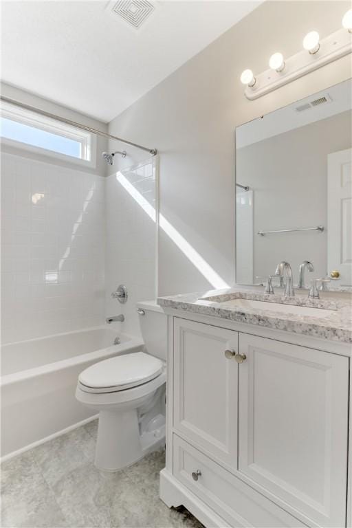 bathroom featuring vanity, visible vents, toilet, and tub / shower combination