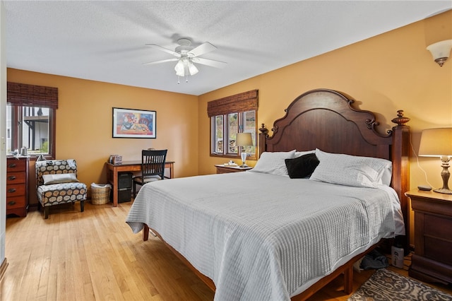 bedroom featuring ceiling fan and light wood finished floors